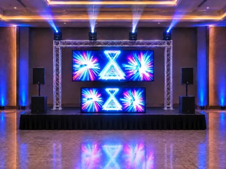 LED screen and compact LED DJ booth with truss lighting for an event rental in Miami