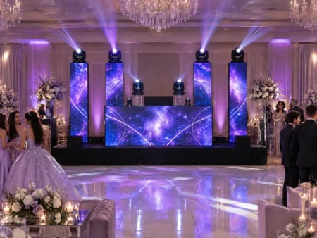 LED DJ booth with four LED towers and six moving head lights at a Miami quinceañera